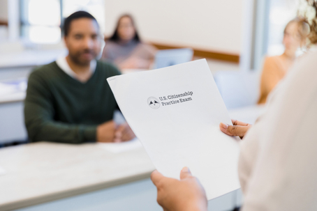 person holding US citizenship practice exam